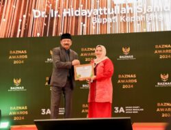 Bupati Bengkalis Terima Penghargaan Baznas Award